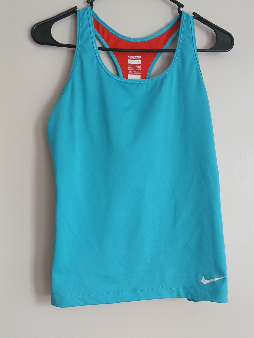 Nike Women's Compression Turquoise Tank Top with Red Inner Panel
